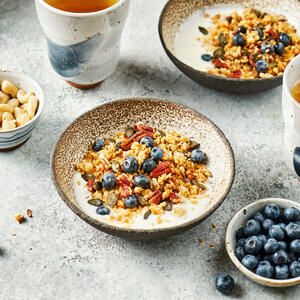 Top with the seeds, nuts, coconut, and granola.