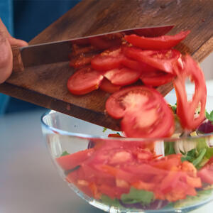 To cut tomatoes.