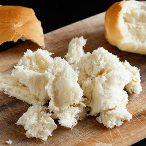 Soak stale bread in water for 10 minutes.