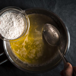 Pour flour into butter