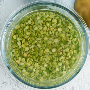 Pour water over the peas