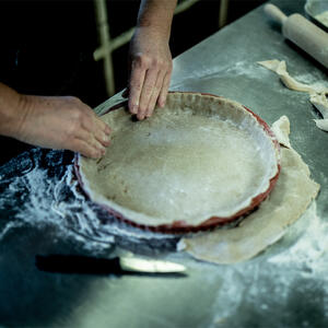 Tuck overhang under and crimp edges with your fingers or a fork. 