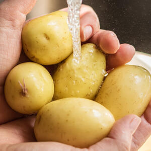 Prick potatoes all over with a fork.