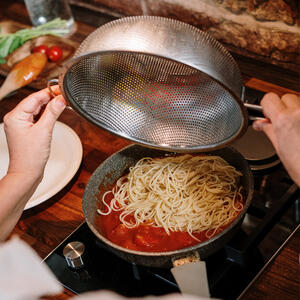  Place in a skillet with tomatoes and stir.