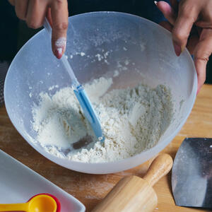 Season flour with salt and pepper. 