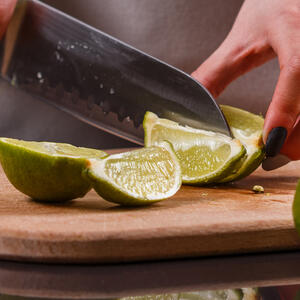 Cut the lime into wedges for serving.