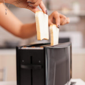 Toast the bread in a toaster or oven until golden brown.