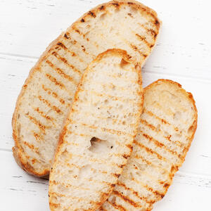 Grill the bread, pour the sauce over