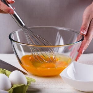 In a bowl, use a fork to whisk together the eggs.