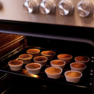  Bake for 20 minutes until golden and a skewer inserted come out clean.