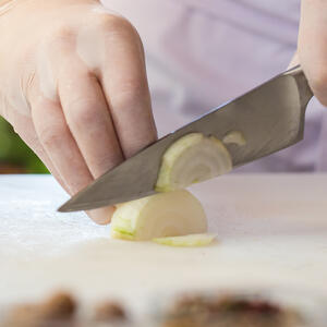 Transfer the chopped ingredients to a slow cooker, pour in water
