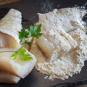 Dip the fish fillets into the mixture on both sides.