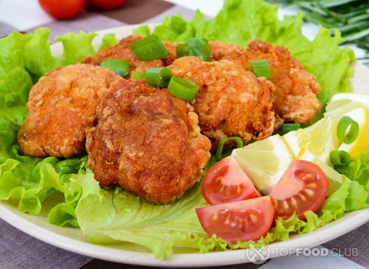 2021-11-12-qx5pe4-fried-caviar-of-river-fish-with-lettuce-leaves-cherry-tomatoes-on-a-light-background-a-dietary-dish-healthy-eating