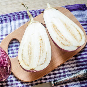 Wash the eggplant, slice off top and bottom