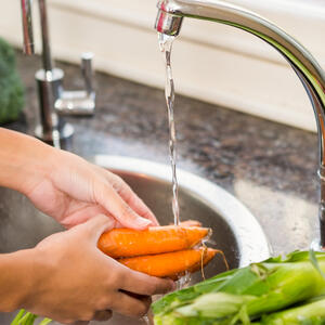 Peel the carrot, then cut into strips.