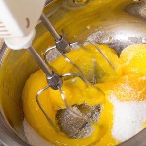 In a large bowl, beat eggs with sugar.