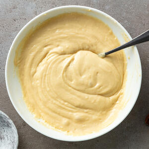 Once buttermilk is ready, add in the wet ingredients in with dry and mix well. 