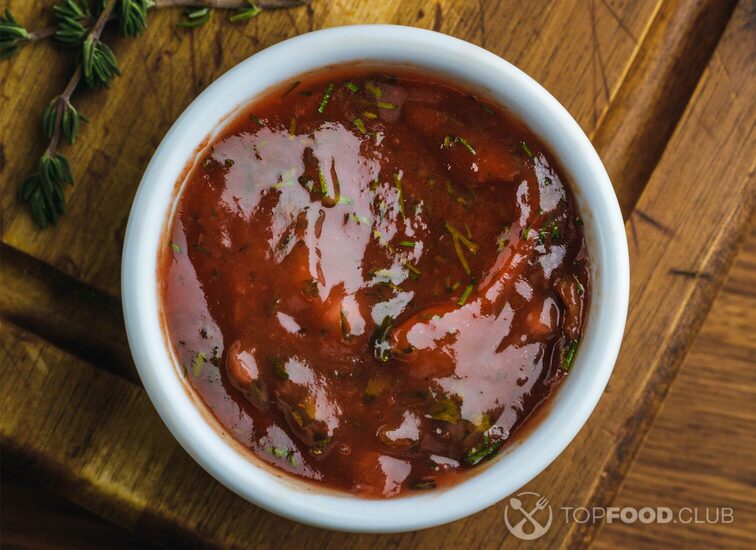 2021-11-18-ki0vb6-top-view-of-bbq-sauce-in-bowl-and-delicious-roaste-2021-08-29-21-19-59-utc