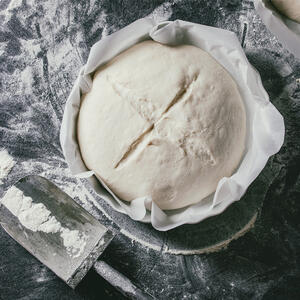 put a dough into baking dish