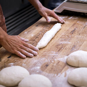 roll the oval into a baguette shape