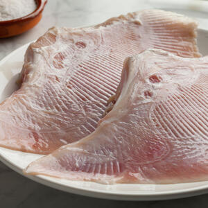 Spoon or brush the garlic butter over the fish.