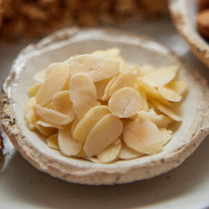 Brown almond petals without oil, stirring occasionally