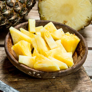 Cut the pineapples into cubes