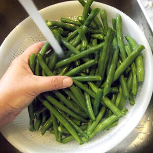 Blanching the beans.