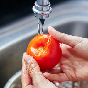 Wash the tomatoes, celery and green onion.
