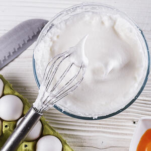 Beat egg whites until stiff