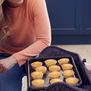 Remove the finished cupcakes from the oven