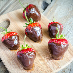 Place the glazed strawberries on a baking sheet
