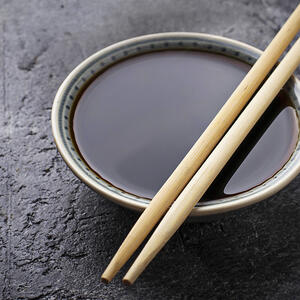 Pour water and soy sauce into a bowl