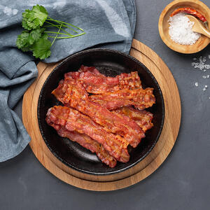 Fry bacon strips until crispy