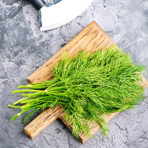 Rinse and cut the dill for the soup