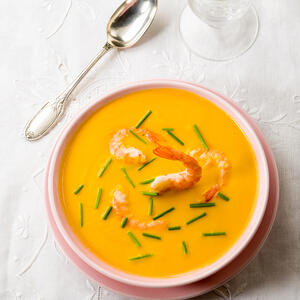 Serve pumpkin and shrimp soup with toppings of choice