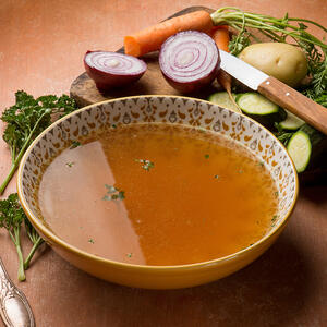 Boil the broth and add the seafood