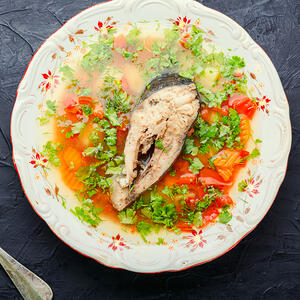 Serve ukha in a plate