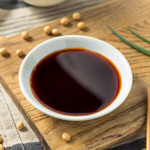 Marinate the meat in the soy sauce and sesame oil with seasoning