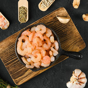 Fry shrimp without shells in a pan