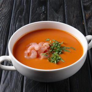 Garnish and serve the gazpacho