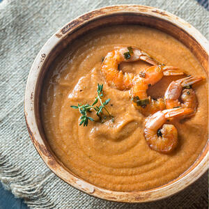 Place whole shrimp in the bowl of soup