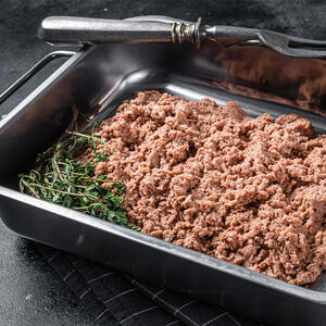 put ground beef into a baking dish