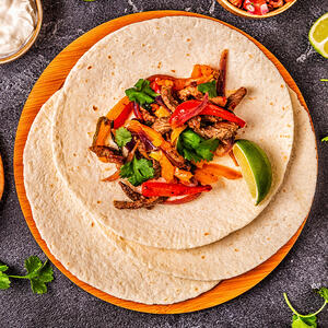 fill the tortilla with a vegetable dressing