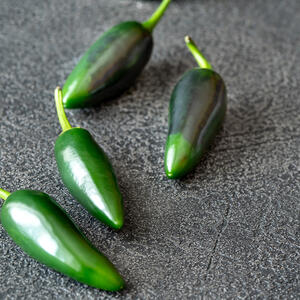 squeeze a few drops of jalapeno pepper juice