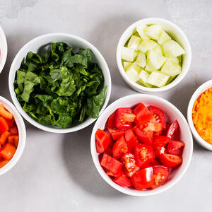 dice cucumbers tomatoes and avocado