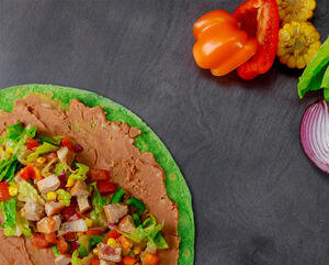 Top tortilla with avocado and tuna mixture