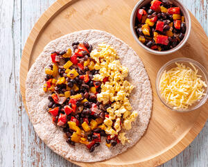 Put the mixture in the middle of tortilla