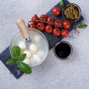 Drain the liquids from mozzarella