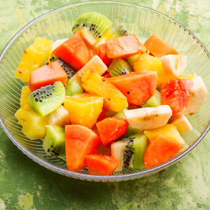 put the chopped fruits in a bowl